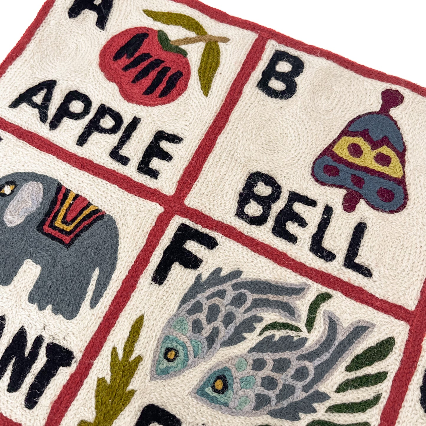 Alphabet pattern hand embroidered rug